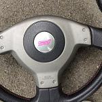 Click image for larger version

Name:	sti steering wheel.JPG
Views:	0
Size:	201.0 KB
ID:	19514