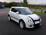 Click image for larger version

Name:	Exterior%20tuning%20on%20white%20Suzuki%20Swift%20with%20stripes%20.jpg
Views:	0
Size:	47.3 KB
ID:	3587
